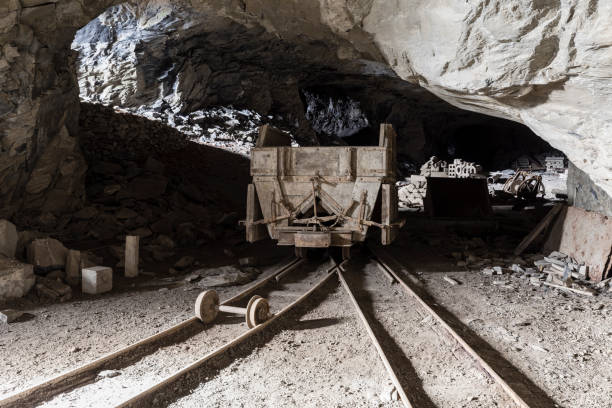 Mining trolley in a tunnel of an abandoned lime mine in Switzerland stock photo