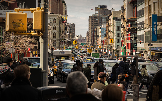 A crowded street shout on the border of Little Italy and China Town in South Manhattan