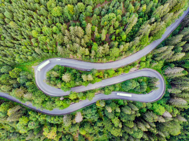 istock Above view of winding mountain pass road 1007720538