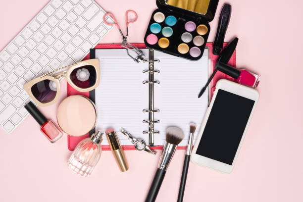 istock Workplace with keyboard and women accessories, top view 1007722854