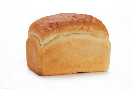 Fresh loaf of white bread isolated on a white background