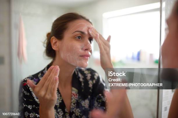 Woman In The Bathroom Stock Photo - Download Image Now - One Woman Only, Acne, Facial Mask - Beauty Product