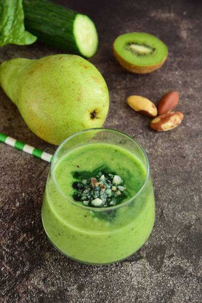 istock Pear kiwi cucumber green smoothie 1007733582