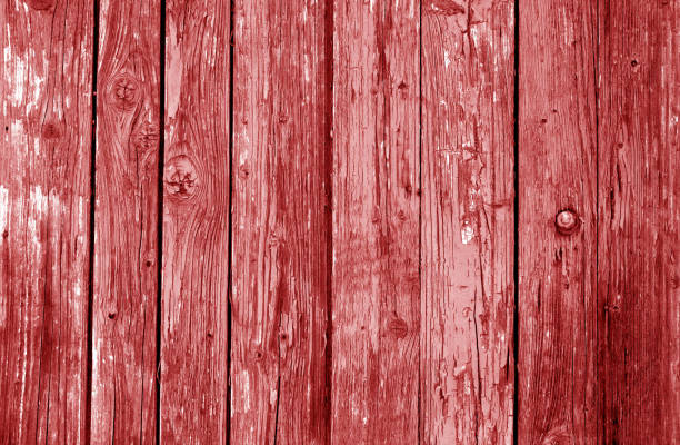 istock Old grunge wooden fence pattern in red tone. 1007733852