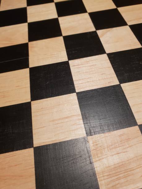 istock How to play wooden board game chess. Improvisation and Different angles of chess sets, pieces and chessboard. White and black figures and board of chess game. 1007753310