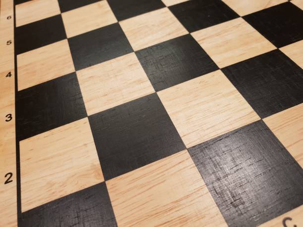 istock How to play wooden board game chess. Improvisation and Different angles of chess sets, pieces and chessboard. White and black figures and board of chess game. 1007753378