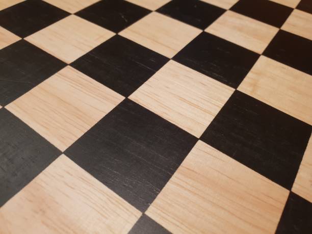 istock How to play wooden board game chess. Improvisation and Different angles of chess sets, pieces and chessboard. White and black figures and board of chess game. 1007753400