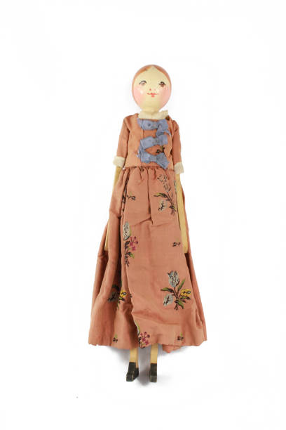 istock Wooden Carved Antique Doll on White Background 1007756770