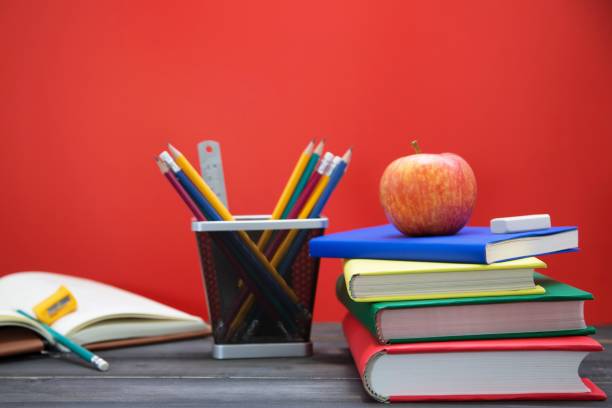 istock School books on desk. and Equipment along with learning. 1007757264
