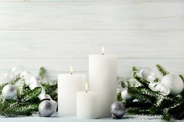 istock Christmas candles with fir-tree branches and baubles 1007766268