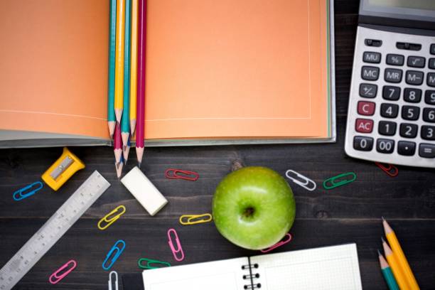 istock School books on desk. and Equipment along with learning. 1007771898