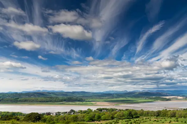 Cirrus clouds from an approaching warm front, with Arnside and the distant lake District hills in the background.