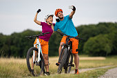 happy proud strong selfie of mountain bike couple
