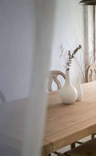 istock Dried eucalyptus branch in vase on wooden table 1007785258