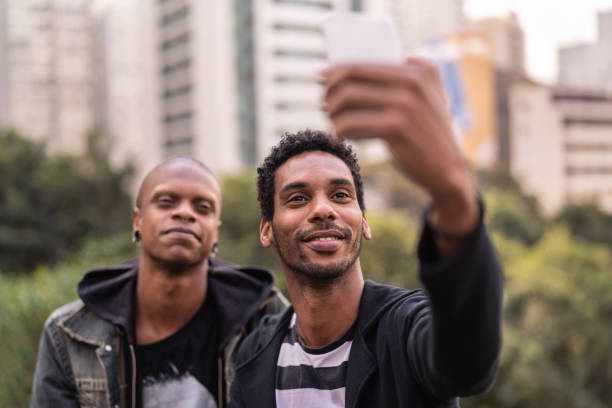istock Self Portrait of two handsome latino african man 1007785848