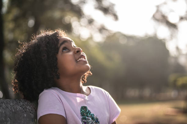 istock Little Cute Girl Dreaming 1007786600