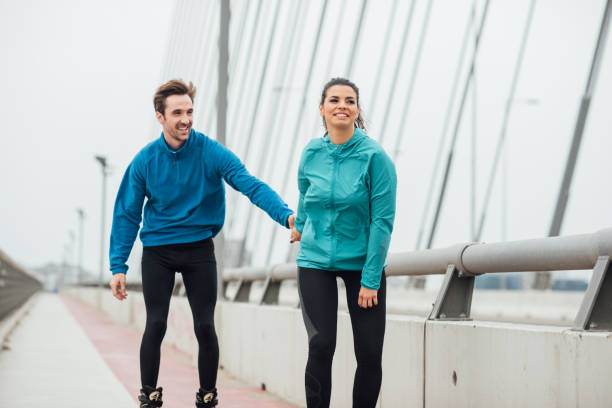 istock Happy man holding hands with girlfriend 1007786746