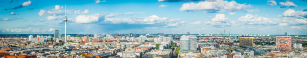 Berlin aerial panorama over Fernsehturm rooftops and Mitte landmarks Germany