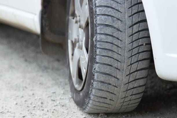 istock Close up of Car Wheel with Tread Pattern for Winter 1007795002