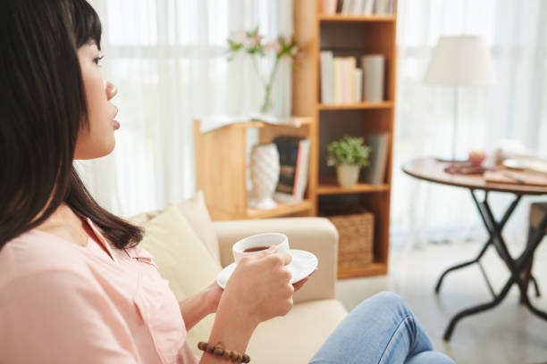 istock Woman enjoying coffee cup 1007797794