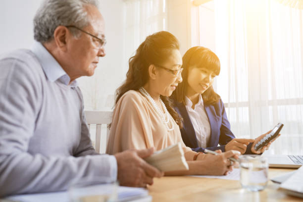 istock Bank manager consulting couple 1007808194