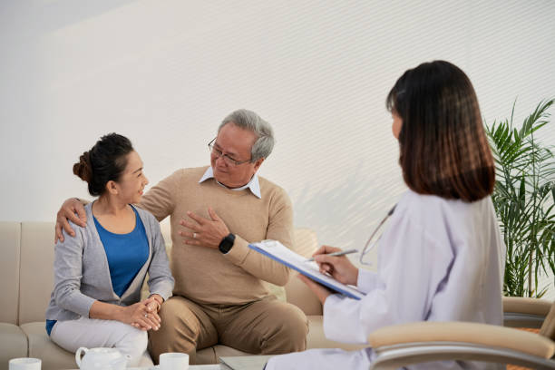 istock Aged couple visiting doctor 1007808328