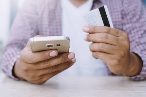 istock business man hands holding credit card 1007817910