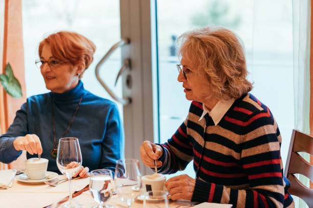 istock Two Senior Women In A Restaurant 1007829272
