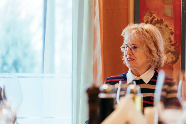 istock Senior Woman In A Restaurant 1007830144