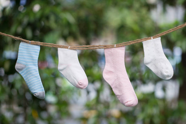 istock knitted babies socks on a wooden background 1007832840