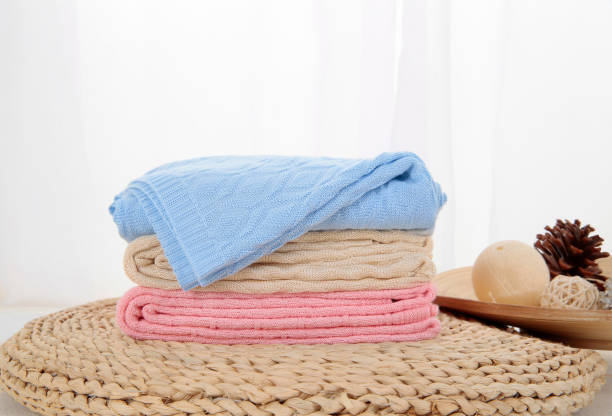 istock Freshly laundered fluffy towels in bedroom interior 1007832912