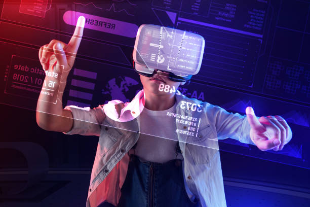 istock Serious girl using additional reality and touching the transparent screen 1007833234