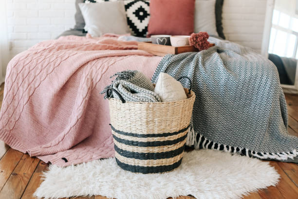bedroom interior basket with blankets stands