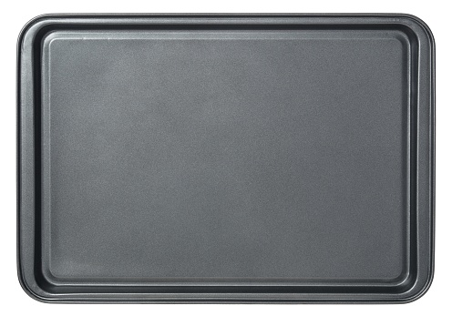 Rectangular black baking tray in oven, isolated on white background. Top view baking tray