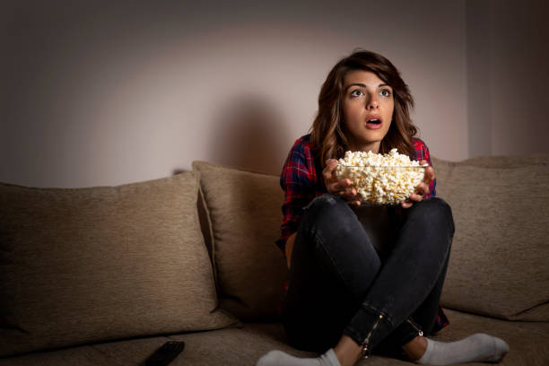 istock Woman watching television 1007836908