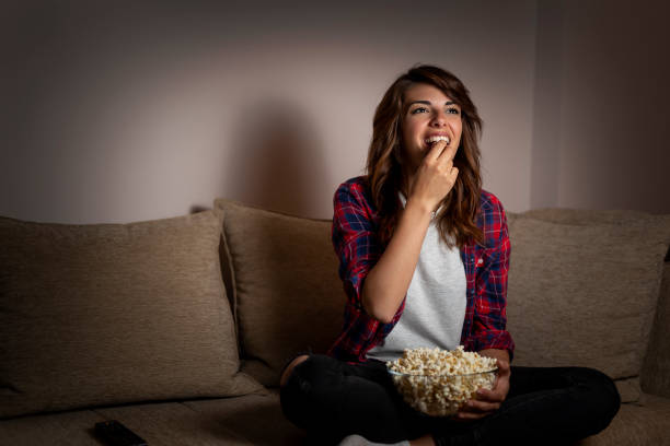 istock Woman watching TV 1007837214