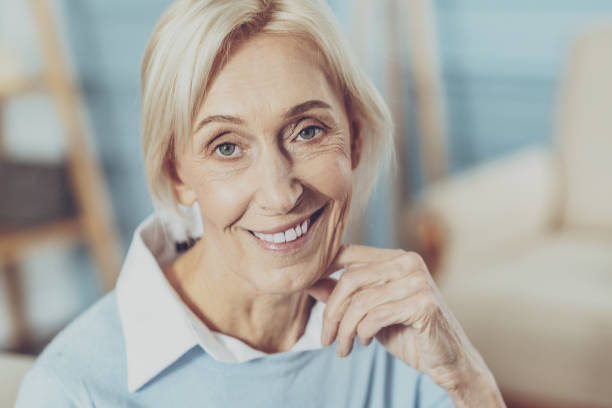 istock Positive delighted blonde demonstrating her emotions 1007844500