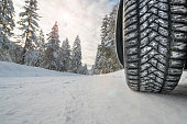 car with winter tires on snowy road