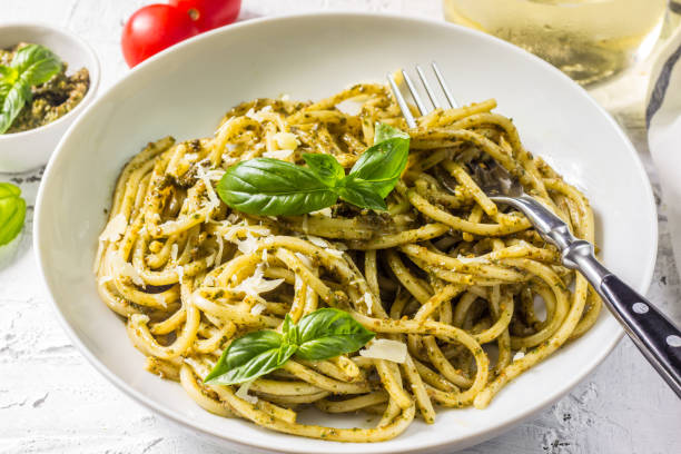 istock Spaghetti with homemade pesto sauce 1007858608