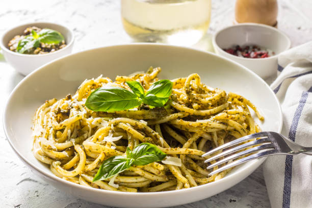 istock Spaghetti with homemade pesto sauce 1007858620