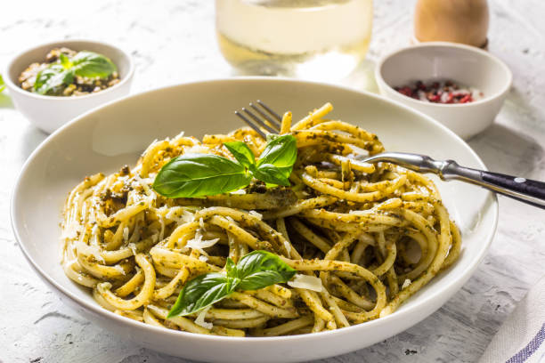 istock Spaghetti with homemade pesto sauce 1007858634