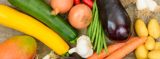 group of fresh vegetables from market - isolated on red still life tomato lemon imagens e fotografias de stock