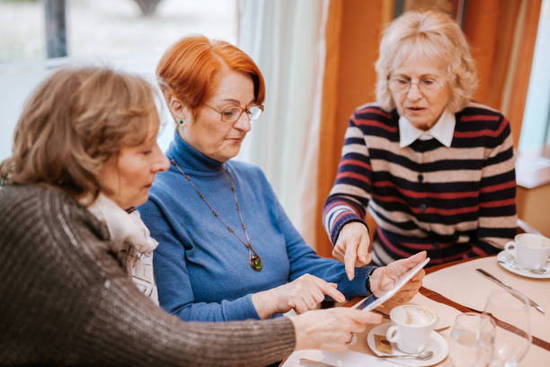 istock Senior Women In A Restaurant 1007877338