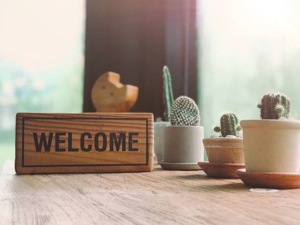Welcome wood label with cactus tree decoration in cafe shop