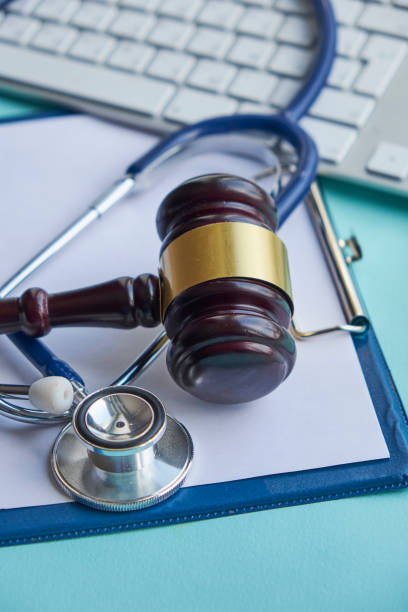 Gavel and stethoscope. medical jurisprudence. legal definition of medical malpractice. attorney. common errors doctors, nurses and hospitals make stock photo