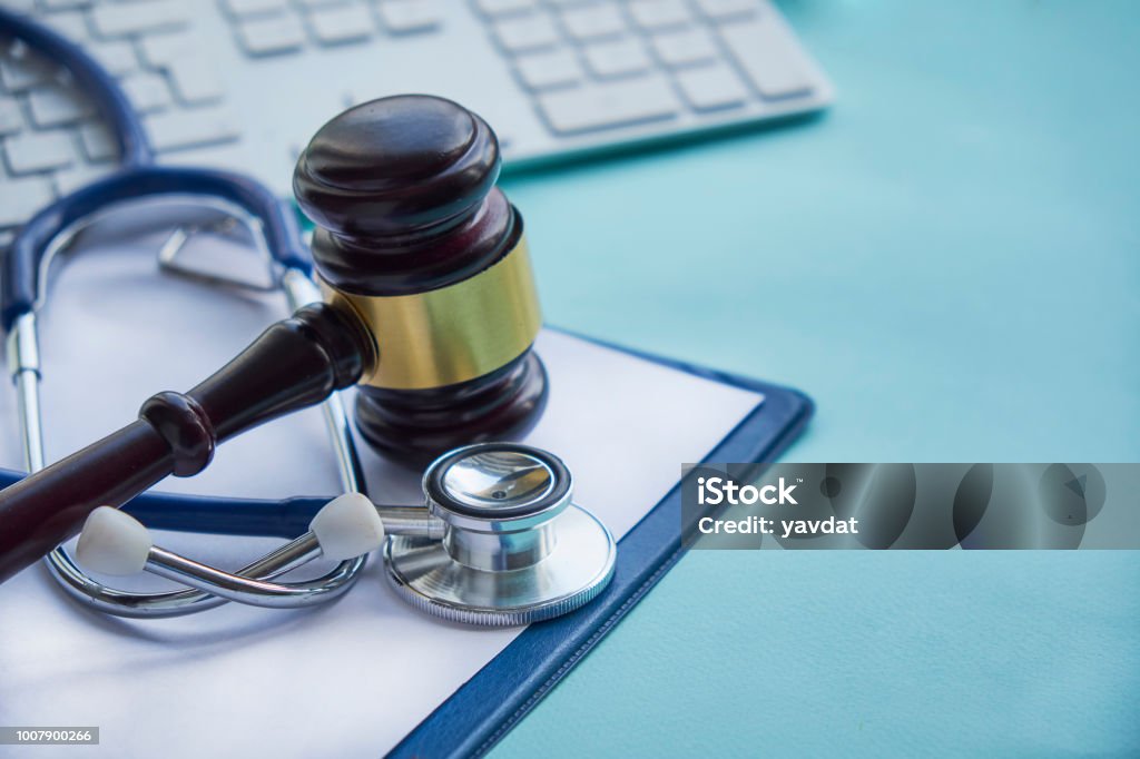 Gavel and stethoscope. medical jurisprudence. legal definition of medical malpractice. attorney. common errors doctors, nurses and hospitals make Healthcare And Medicine Stock Photo