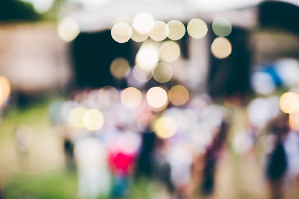 istock Blurred crowd on music festival 1007916086