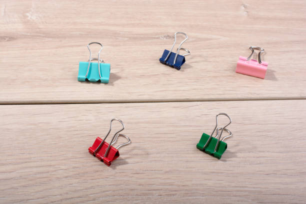 istock Picture of metallic binder clips with handles 1007916752