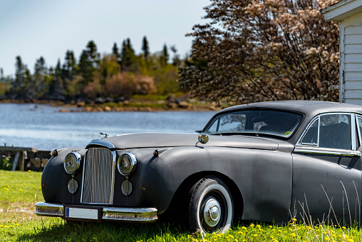Newfoundland, Canada - June 8, 2018. Side view of a mint condition oldtimer 1955 Jaguar Mark VII sedan built in the UK by Jaguar cars. This model was built between 1950 and 1956.