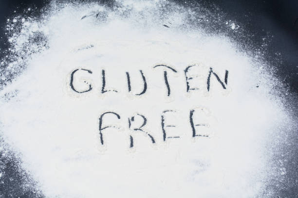 istock Word gluten free on black marble board with flour 1007936920